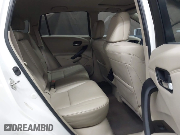 2018 Acura RDX with VIN 5J8TB3H38JL011983, listed as a IAAI auction lot 42385892 with 100,562 mi miles and . Bid and sale history available at DreamBid. Image 8.
