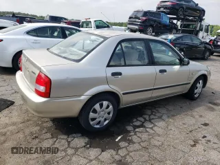 2003 Mazda Protege DX with VIN JM1BJ225X30107443, listed as a Copart auction lot 54777625 with 283,760 mi miles and Clean Title. Bid and sale history available at DreamBid. Image 3.