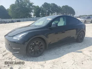 2022 Tesla Model Y Performance z VIN 7SAYGDEF5NF344292, wystawiony jako Copart lot #59153775 z przebiegiem Nie podano mil oraz Szkoda całkowita • Salvage title. Historia ofert i sprzedaży dostępna na DreamBid. Obrazek 1.