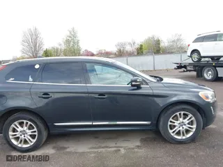 2015 Volvo XC60 T5 with VIN YV4612RKXF2710010, listed as a IAAI auction lot 41962055 with 163,050 mi miles. Bid and sale history available at carsss.com. Image 13.