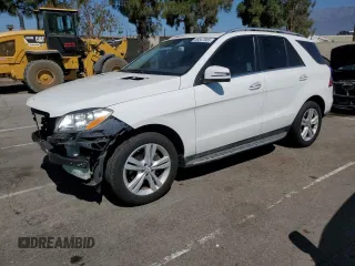 2015 Mercedes-Benz M 350 with VIN 4JGDA5JB6FA566089, listed as a Copart auction lot 66547685 with 69,696 mi miles and Salvage title. Bid and sale history available at DreamBid. Image 1.