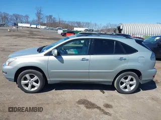 2008 Lexus RX with VIN 2T2HK31U98C071341, listed as a IAAI auction lot 41829229 with 166,031 mi miles. Bid and sale history available at carsss.com. Image 14.
