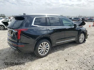 2020 Cadillac XT6 FWD Premium Luxury with VIN 1GYKPCRSXLZ104502, listed as a Copart auction lot 47808125 with 97,053 mi miles and Salvage Title. Bid and sale history available at carsss.com. Image 3.