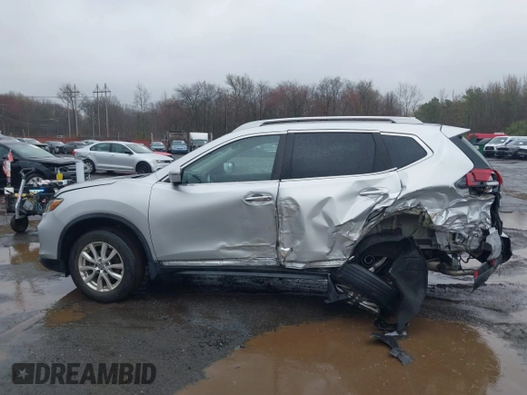 2018 Nissan Rogue SV with VIN 5N1AT2MVXJC800314, listed as a IAAI auction lot 42021347 with 27,129 mi miles and . Bid and sale history available at DreamBid. Image 17.