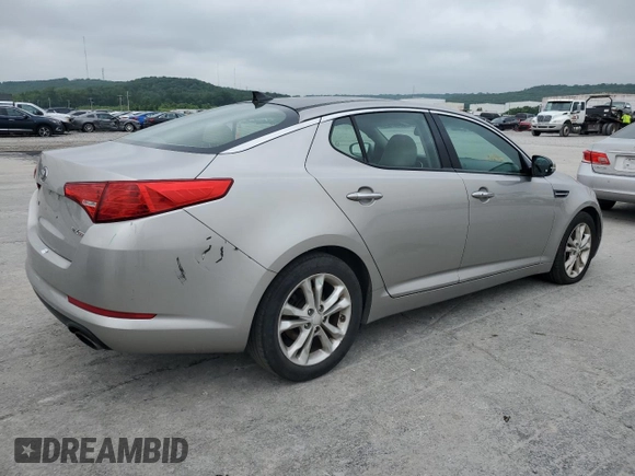 2013 Kia Optima EX z VIN 5XXGN4A76DG124488, wystawiony jako Copart lot #59487325 z przebiegiem 161 440 mil mil oraz Szkoda całkowita • Salvage title. Historia ofert i sprzedaży dostępna na DreamBid. Obrazek 3.