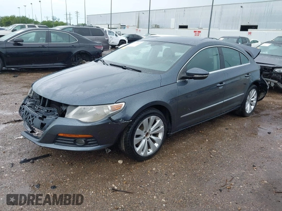 2009 Volkswagen CC Sport with VIN WVWML73C79E553395, listed as a IAAI auction lot 42078061 with 167,110 mi miles. Bid and sale history available at carsss.com. Image 2.
