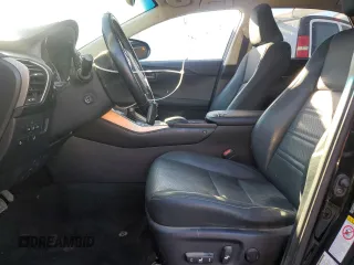2017 Lexus NX 300h with VIN JTJBJRBZ4H2052654, listed as a Copart auction lot 82827884 with 125,711 mi miles and Salvage Title. Bid and sale history available at DreamBid. Image 7.