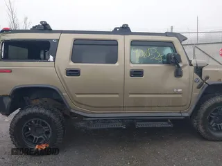 2005 Hummer H2 SUV with VIN 5GRGN23U35H130615, listed as a IAAI auction lot 41085325 with 138,393 mi miles. Bid and sale history available at carsss.com. Image 13.