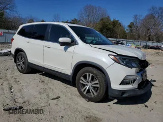 2017 Honda Pilot EX-L with VIN 5FNYF5H52HB029706, listed as a Copart auction lot 47736475 with 115,173 mi miles and Salvage Title. Bid and sale history available at carsss.com. Image 4.