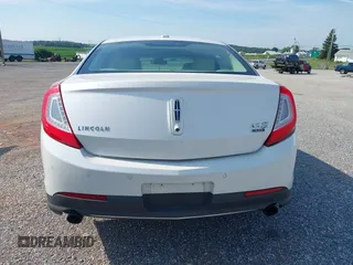 2013 Lincoln MKS EcoBoost with VIN 1LNHL9FT4DG614140, listed as a IAAI auction lot 42866991 with 126,487 mi miles and . Bid and sale history available at DreamBid. Image 16.