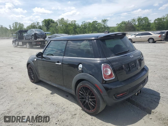 2011 MINI Hardtop S with VIN WMWSV3C53BTY20316, listed as a Copart auction lot 53974865 with 102,235 mi miles and Salvage Title. Bid and sale history available at DreamBid. Image 2.