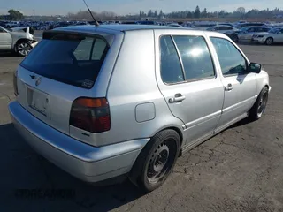 1999 Volkswagen Golf z VIN 3VWJA81HXXM215507, wystawiony jako IAAI lot #41391464 z przebiegiem 167 875 mil mil oraz . Historia ofert i sprzedaży dostępna na DreamBid. Obrazek 4.