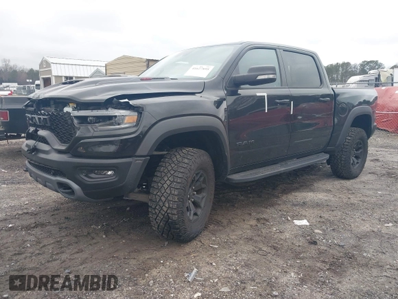 2022 Ram 1500 TRX with VIN 1C6SRFU9XNN476106, listed as a IAAI auction lot 41627895 with 21,992 mi miles and . Bid and sale history available at DreamBid. Image 17.