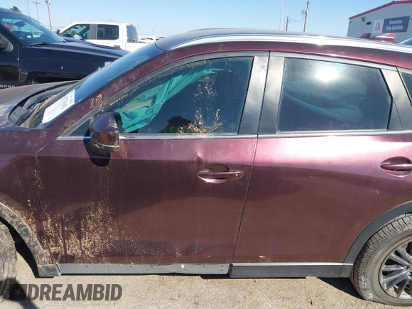2019 Mazda CX-5 Sport with VIN JM3KFABM2K0686372, listed as a IAAI auction lot 41770183 with 57,202 mi miles and . Bid and sale history available at DreamBid. Image 14.