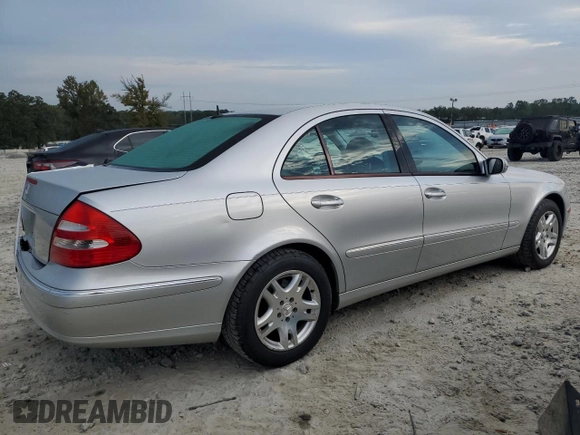 2003 Mercedes-Benz E-Class 3.2L with VIN WDBUF65J93A087012, listed as a Copart auction lot 67157614 with 146,985 mi miles and Salvage Title. Bid and sale history available at carsss.com. Image 3.