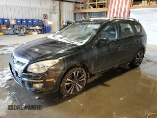 2011 Hyundai Elantra Touring SE with VIN KMHDC8AE0BU126352, listed as a Copart auction lot 88033015 with 166,935 mi miles and Clean Title. Bid and sale history available at carsss.com. Image 1.