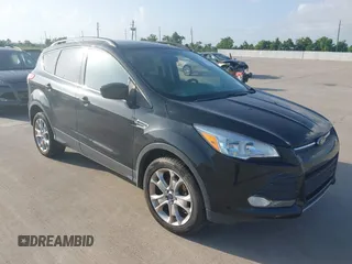 2013 Ford Escape SE with VIN 1FMCU0GX1DUA90922, listed as a IAAI auction lot 42749107 with 104,873 mi miles and . Bid and sale history available at DreamBid. Image 1.
