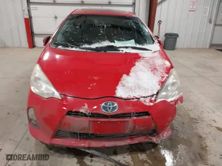 2013 Toyota Prius c One with VIN JTDKDTB32D1038030, listed as a IAAI auction lot 41568174 with 1 mi miles. Bid and sale history available at carsss.com. Image 11.