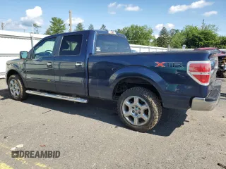 2014 Ford F-150 XL with VIN 1FTFW1ET2EFC54587, listed as a Copart auction lot 64996265 with 96,712 mi miles and Salvage title. Bid and sale history available at DreamBid. Image 2.