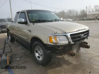 2000 Ford F-150 XL with VIN 2FTRX17W0YCA73568, listed as a Copart auction lot 51128035 with 208,737 mi miles and Salvage Title. Bid and sale history available at carsss.com. Image 4.