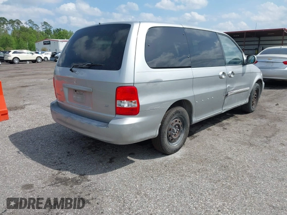 2003 Kia Sedona LX with VIN KNDUP131236417368, listed as a IAAI auction lot 41863624 with 142,896 mi miles. Bid and sale history available at carsss.com. Image 4.