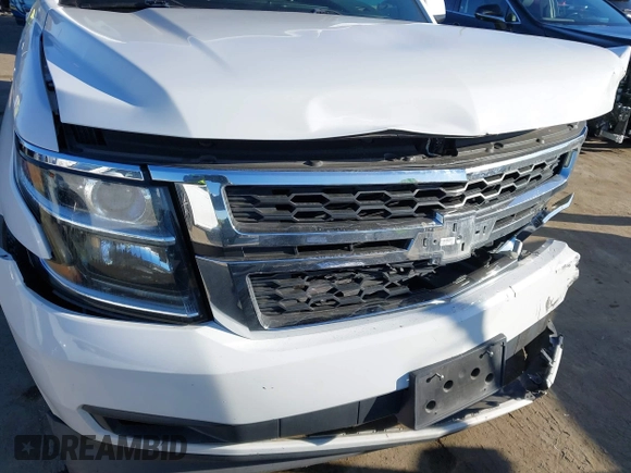 2015 Chevrolet Suburban LT with VIN 1GNSCJKC2FR680413, listed as a IAAI auction lot 41634666 with 127,175 mi miles and . Bid and sale history available at DreamBid. Image 17.