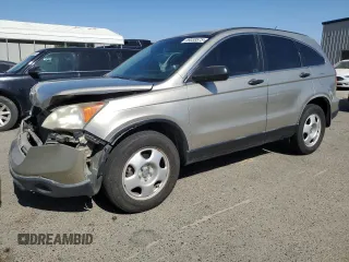 2007 Honda CR-V LX z VIN JHLRE38347C012091, wystawiony jako Copart lot #59039575 z przebiegiem 256 091 mil mil oraz Szkoda całkowita • Salvage title. Historia ofert i sprzedaży dostępna na DreamBid. Obrazek 1.