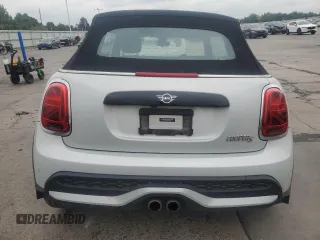 2022 MINI Convertible Cooper S z VIN WMW43DL09N3N60064, wystawiony jako Copart lot #66324525 z przebiegiem 68 126 mil mil oraz Szkoda całkowita • Salvage title. Historia ofert i sprzedaży dostępna na DreamBid. Obrazek 6.
