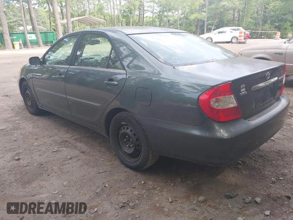 2002 Toyota Camry LE z VIN 4T1BE32K12U619689, wystawiony jako IAAI lot #42222078 z przebiegiem 216 591 mil mil oraz . Historia ofert i sprzedaży dostępna na DreamBid. Obrazek 3.