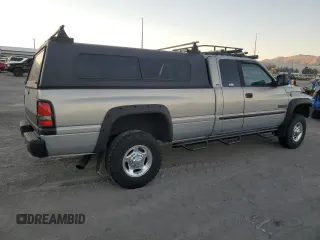 2000 Dodge Ram 2500 with VIN 1B7KF2369YJ144753, listed as a Copart auction lot 80801414 with 173,413 mi miles and Salvage Title. Bid and sale history available at carsss.com. Image 3.