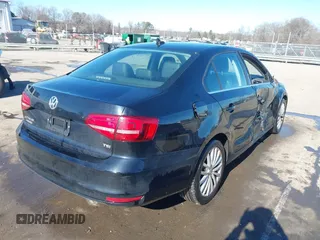 2015 Volkswagen Jetta Sedan 1.8T SE w/Connectivity with VIN 3VWD07AJ6FM303403, listed as a IAAI auction lot 41330778 with 150,949 mi miles. Bid and sale history available at carsss.com. Image 4.