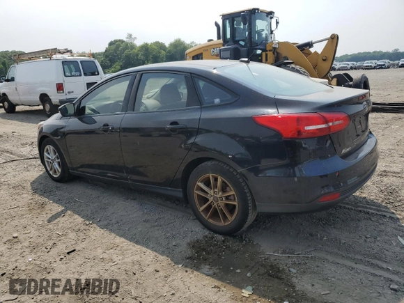 2017 Ford Focus SE with VIN 1FADP3FE7HL280968, listed as a Copart auction lot 60016415 with 90,832 mi miles and Clean title. Bid and sale history available at DreamBid. Image 2.