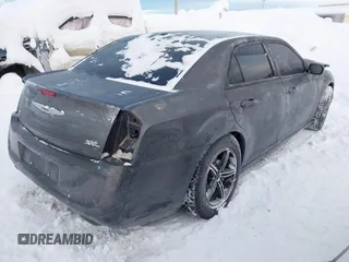 2014 Chrysler 300 with VIN 2C3CCAGG9EH297337, listed as a IAAI auction lot 41268387 with 104,542 mi miles. Bid and sale history available at carsss.com. Image 4.