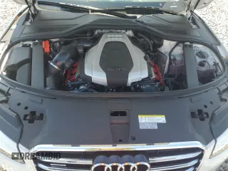 2015 Audi A8 3.0T z VIN WAU3GAFD9FN033886, wystawiony jako Copart lot #60137395 z przebiegiem 48 281 mil mil oraz Szkoda całkowita • Salvage title. Historia ofert i sprzedaży dostępna na DreamBid. Obrazek 11.
