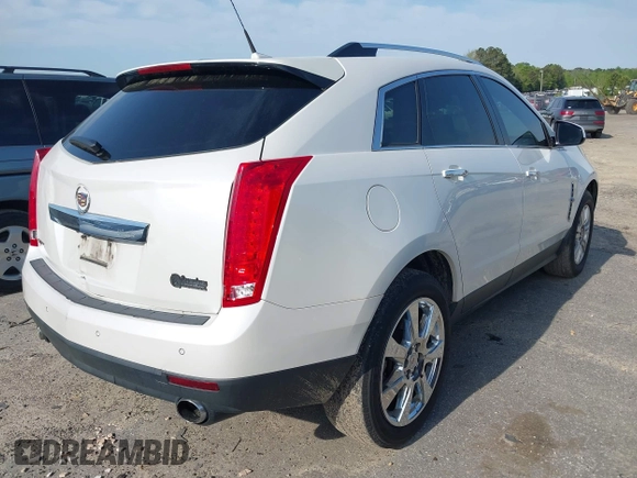 2011 Cadillac SRX Performance Collection with VIN 3GYFNBEYXBS540807, listed as a IAAI auction lot 42034047 with 198,429 mi miles. Bid and sale history available at carsss.com. Image 4.