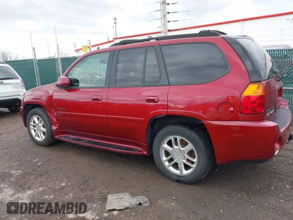 2006 GMC Envoy Denali with VIN 1GKET63M762119339, listed as a IAAI auction lot 41837443 with 192,458 mi miles. Bid and sale history available at carsss.com. Image 14.