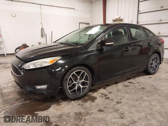 2015 Ford Focus SE with VIN 1FADP3F24FL255450, listed as a IAAI auction lot 41673301 with 103,650 mi miles. Bid and sale history available at carsss.com. Image 20.