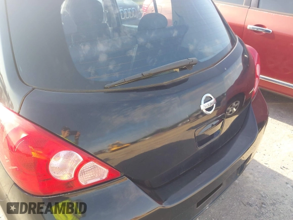 2007 Nissan Versa 1.8 S with VIN 3N1BC13E97L359537, listed as a IAAI auction lot 42127935 with 128,891 mi miles. Bid and sale history available at carsss.com. Image 13.