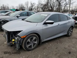 2020 Honda Civic Sedan LX with VIN 2HGFC2F62LH577025, listed as a Copart auction lot 86735254 with 30,966 mi miles and Salvage Title. Bid and sale history available at carsss.com. Image 1.