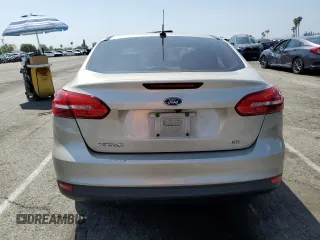 2018 Ford Focus SE z VIN 1FADP3F23JL303948, wystawiony jako Copart lot #55698915 z przebiegiem 85 500 mil mil oraz Szkoda całkowita • Salvage title. Historia ofert i sprzedaży dostępna na DreamBid. Obrazek 6.