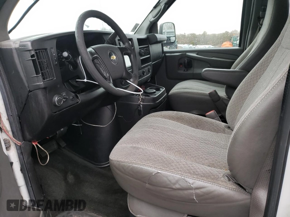 2012 Chevrolet Express Passenger 1LT with VIN 1GAZGYFG3C1118315, listed as a Copart auction lot 80870104 with 122,178 mi miles and Salvage title. Bid and sale history available at DreamBid. Image 7.