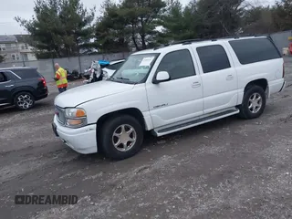 2006 GMC Yukon XL Denali with VIN 1GKFK66U86J133629, listed as a IAAI auction lot 41094116 with 208,665 mi miles. Bid and sale history available at carsss.com. Image 2.