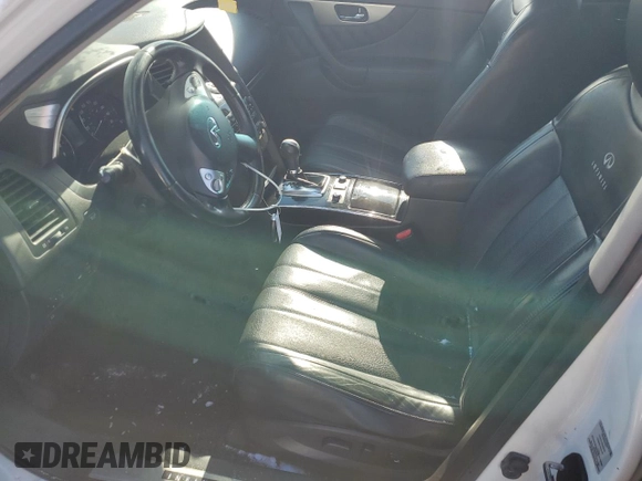2014 Infiniti QX70 z VIN JN8CS1MW6EM413489, wystawiony jako Copart lot #87665875 z przebiegiem 139 371 mil mil oraz Czysty tytuł • Clean title. Historia ofert i sprzedaży dostępna na DreamBid. Obrazek 7.