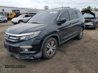 2017 Honda Pilot EX-L z VIN 5FNYF6H70HB010501, wystawiony jako Copart lot #57384115 z przebiegiem 133 133 mil mil oraz Szkoda całkowita • Salvage title. Historia ofert i sprzedaży dostępna na DreamBid. Obrazek 1.