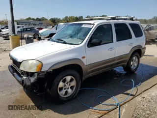 2002 Mazda Tribute LX with VIN 4F2YU09132KM10219, listed as a Copart auction lot 70619724 with 202,687 mi miles and Salvage Title. Bid and sale history available at carsss.com. Image 1.