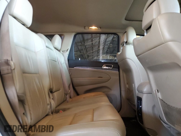 2014 Jeep Grand Cherokee Limited with VIN 1C4RJFBTXEC247661, listed as a Copart auction lot 57435625 with 103,782 mi miles and Salvage title. Bid and sale history available at DreamBid. Image 10.