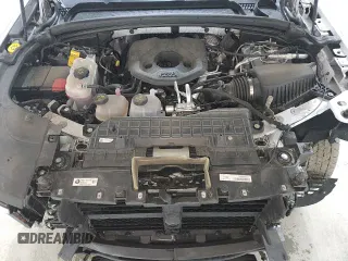 2024 Jeep Grand Cherokee with VIN 1C4RJYB69RC129743, listed as a Copart auction lot 87460235 with 56,990 mi miles and Clean title. Bid and sale history available at DreamBid. Image 15.