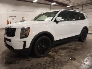 2022 Kia Telluride EX z VIN 5XYP3DHC2NG201167, wystawiony jako IAAI lot #42572806 z przebiegiem 67 409 mil mil oraz . Historia ofert i sprzedaży dostępna na DreamBid. Obrazek 2.