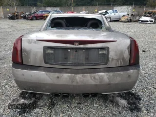 2004 Cadillac XLR z VIN 1G6YV34AX45601257, wystawiony jako Copart lot #44490755 z przebiegiem Nie podano mil oraz Szkody całkowita. Historia ofert i sprzedaży dostępna na DreamBid. Obrazek 6.
