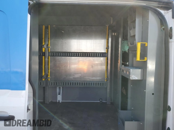 2022 Ford E-Transit Cargo z VIN 1FTBW3XK3NKA35658, wystawiony jako Copart lot #44248515 z przebiegiem 50 410 mil mil oraz Czysty tytuł • Clean title. Historia ofert i sprzedaży dostępna na DreamBid. Obrazek 11.
